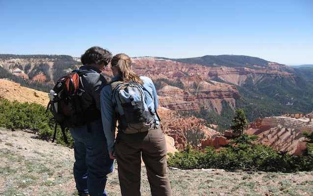 Visitors admire the view of Cedar Breaks' geologic amphitheater