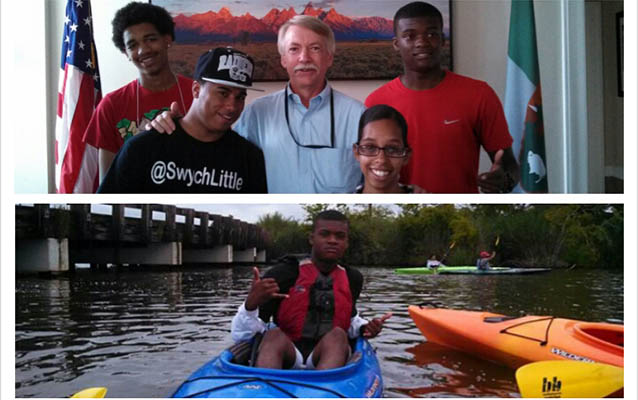 YAP! members with Director Jon Jarvis and YAP! member Soulo in a blue kayak