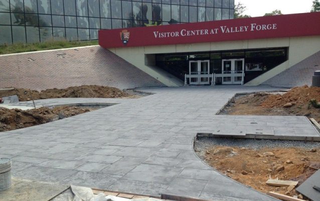 Freshly poured concrete was stamped and textured and nearly ready for use