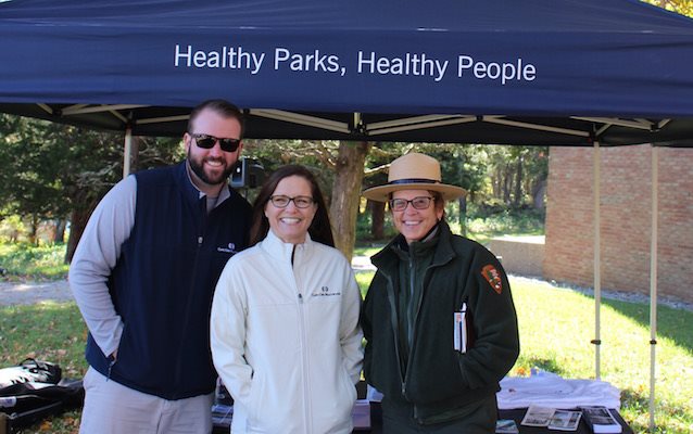 3 program leaders at health fair