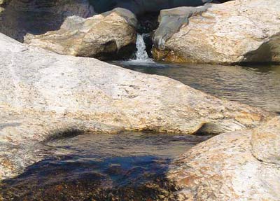 Water flowing from one pool to another