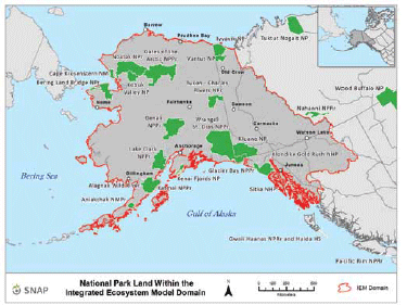 A map of Alaska and Northern Canada with park areas indicated in green