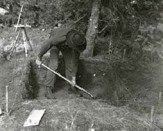 black and white image of a man digging a hole black and white image of a man digging a hole