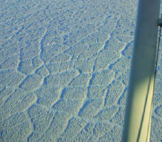 aerial view of a landscape with polygon shapes in the soil