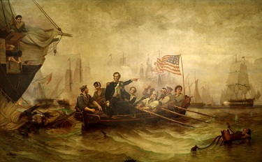 US sailors rowing an officer which is standing in the row boat and pointing