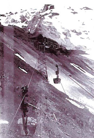 sepia tone image of a mountainside with tram running up it