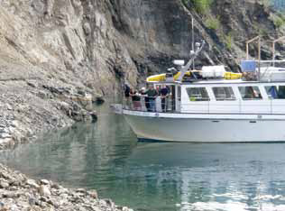 a boat extremely close to the shore