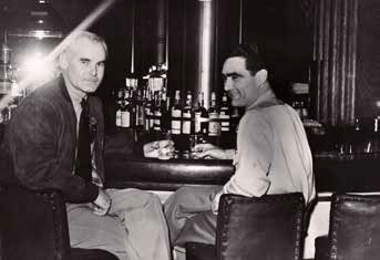 two men sitting at a table two men sitting at a table