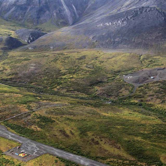 tree-less landscape of hills and mountains