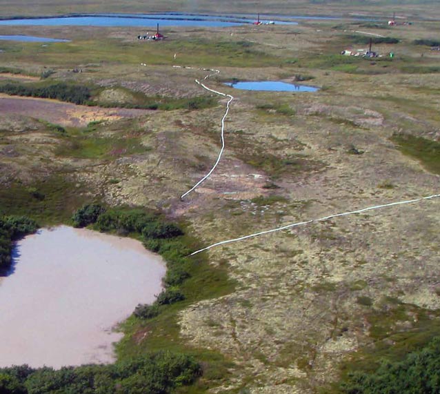 aerial view of ponds in a tree-less landscape aerial view of ponds in a tree-less landscape