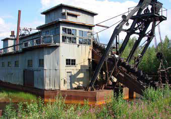 large while building with a crane of some kind attached large while building with a crane of some kind attached