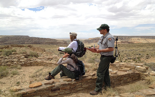 Park personnel evaluating a view