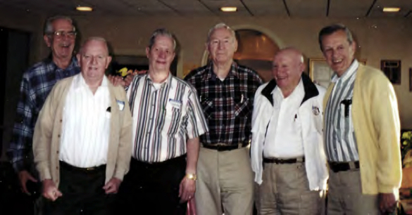 Six men pose for camera. Six men pose for camera.