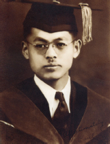 Image of young man in wearing a cap and gown dressed for a graduation ceremony. Image of young man in wearing a cap and gown dressed for a graduation ceremony.