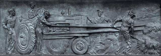 Brass relief of farmers harvesting wheat Brass relief of farmers harvesting wheat