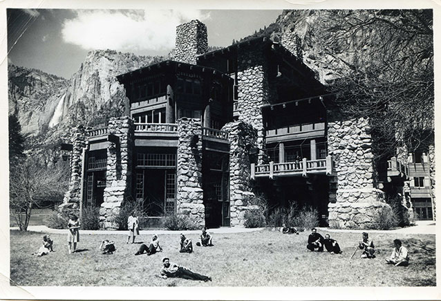 B&W photo of sailors reclining in front of ahwahnee hotel