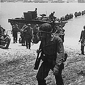 US troops on beach at Saipan