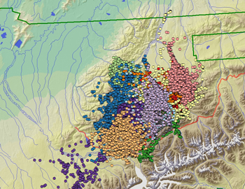 A map showing a cluster of colored dots representing the movement of bears. A map showing a cluster of colored dots representing the movement of bears.