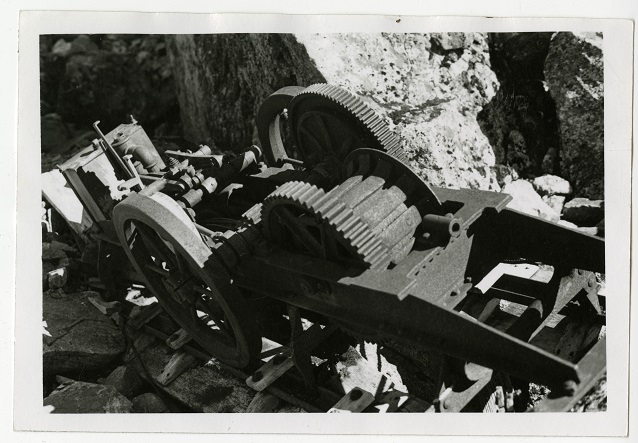 Black and white image of rusted metal item and rocks Black and white image of rusted metal item and rocks