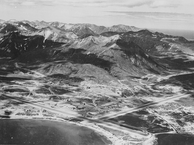 Airplane runways and mountains near the ocean Airplane runways and mountains near the ocean