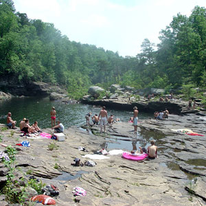 People enjoy a cool dip in Little Falls in Alabama.