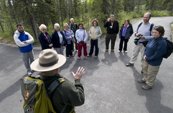 Interpretive ranger talks to a group of Park visitors.