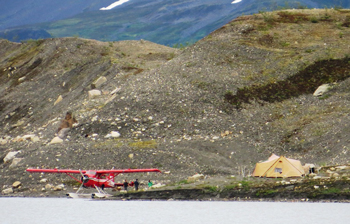 a small plane drops off backpackers