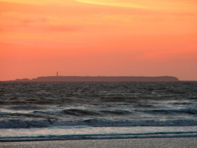 island with lighthouse on it