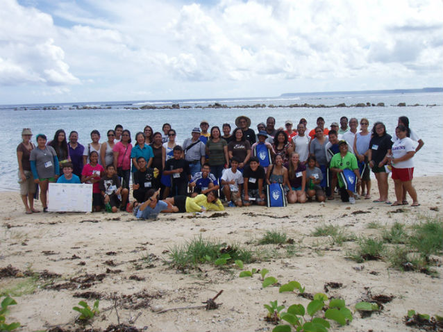 students on beach in Guam