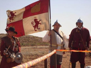 Living history reenactors dressed in 16th-century period clothing