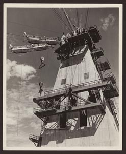 Black and white photo of the Headway tower with long cables