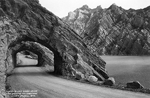 Black and white photo of Cody Road with canyon tunnels.