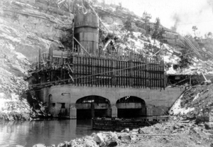 Black and white photo of Guernsey Dam under construction 