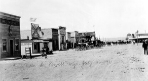 Black and white photo of a small dessert town. 