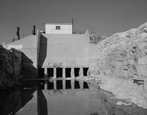 Black and white photo of Avalon Dam on the Pecos river.