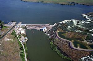 Sky view of Minidoka Powerplant and Minidoka Dam surrounded by water Sky view of Minidoka Powerplant and Minidoka Dam surrounded by water
