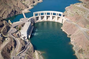 Sky view of Parker Dam surrounded by water 