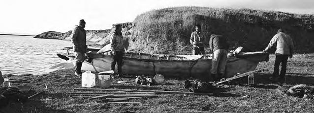 People setting up camp on Meade River.