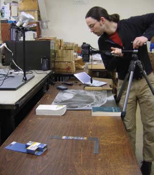 A man documenting Giddings’ site location information.