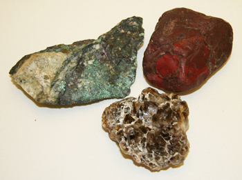 three rock and mineral samples