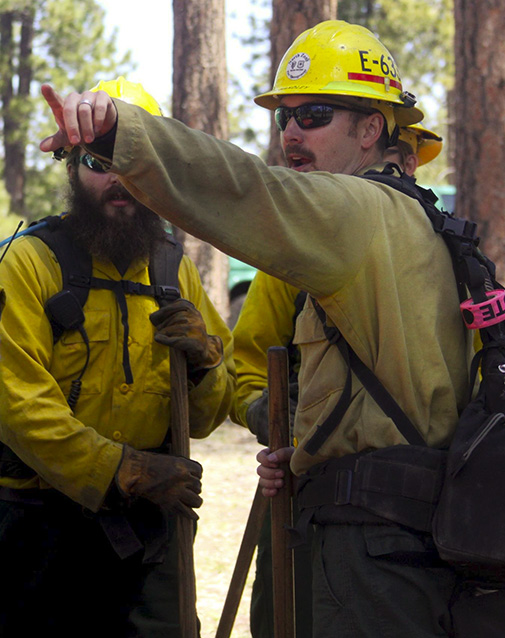 Wildland firefighters arrive on scene of a simulated wildfire