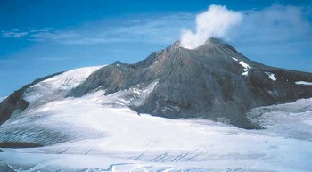 rocky volcano with gas coming out the top