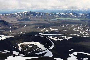 aerial view of a snowy crater