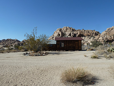 Keys Ranch- original building with tumbleweeds in the foreground