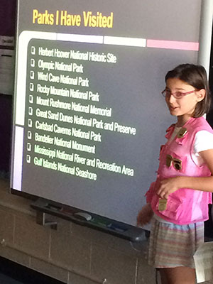 Talia, in her famous pink Jr Ranger vest, shares her experiences to her classmates Talia, in her famous pink Jr Ranger vest, shares her experiences to her classmates