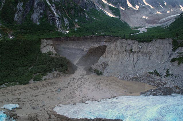 mountains with a large eroded slope at their foot