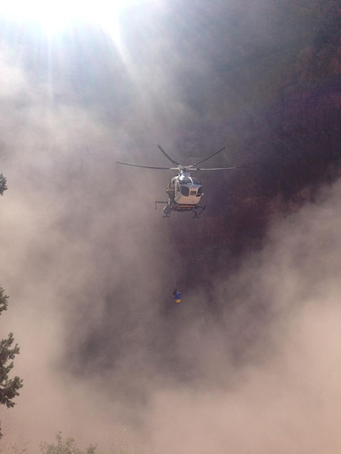 Helicopter flying in smoke Helicopter flying in smoke