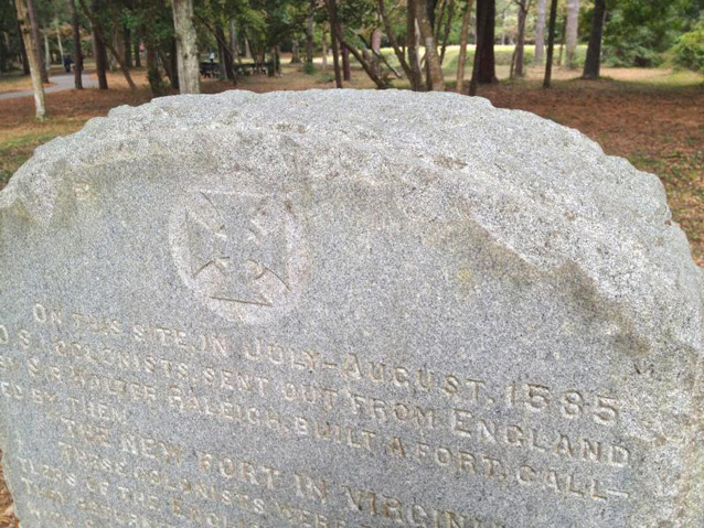 Present-day image of Virginia Dare marker with earthwork in background
