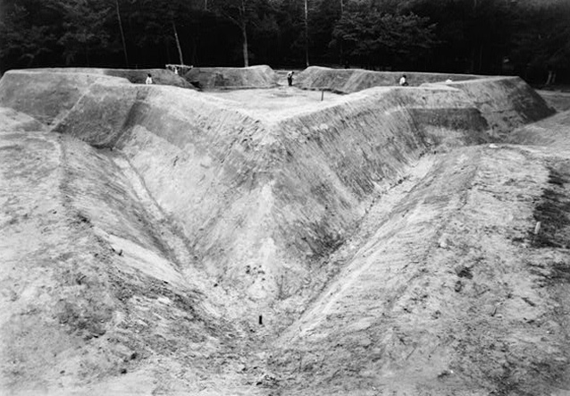 Archeologists reconstructing the earthwork, 1950