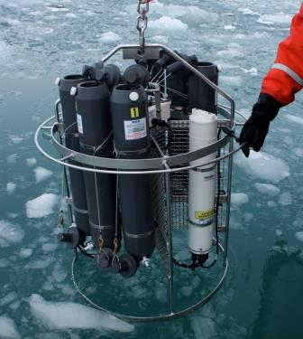 instrument that measures conductivity, temperature, and depth, is lowered into the ocean instrument that measures conductivity, temperature, and depth, is lowered into the ocean